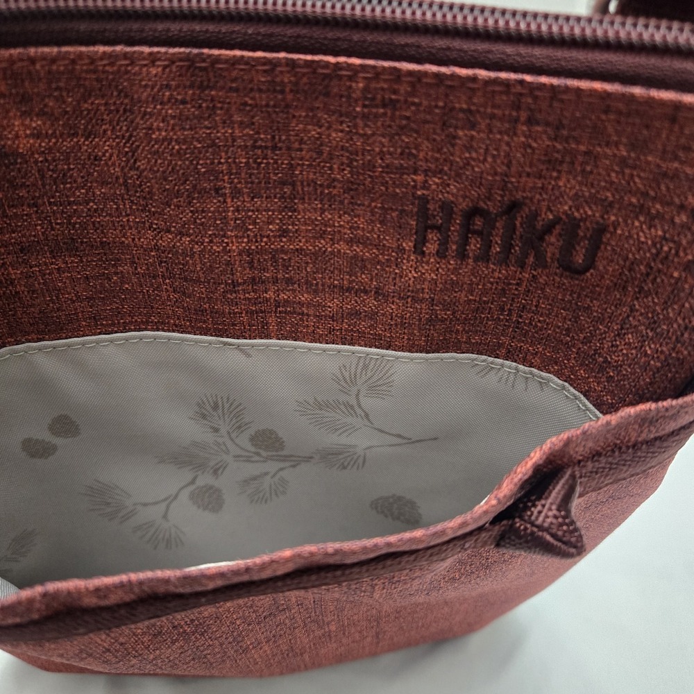 Haiku Reddish Brown Travel Bag - Picture 3 of 12